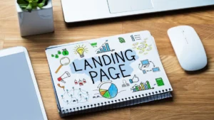 LANDING PAGEと書かれたノートとマーケティングのイラスト